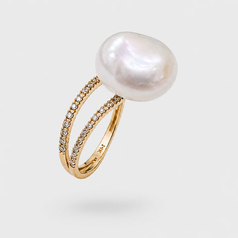 14K yellow gold pavé diamond double band ring with large baroque white pearl floating angled product shot light gray background showing 14K hallmark