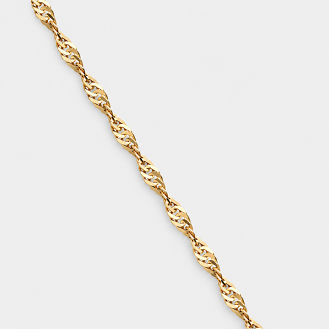 Close-up of the twisted rope links on the solid 18K Italian yellow gold chain necklace by Vaskia Jewelry.
