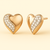 18K White and Rose Gold Diamond Heart Earrings with pavé-set diamonds and sculpted two-tone heart design by Vaskia Jewelry
