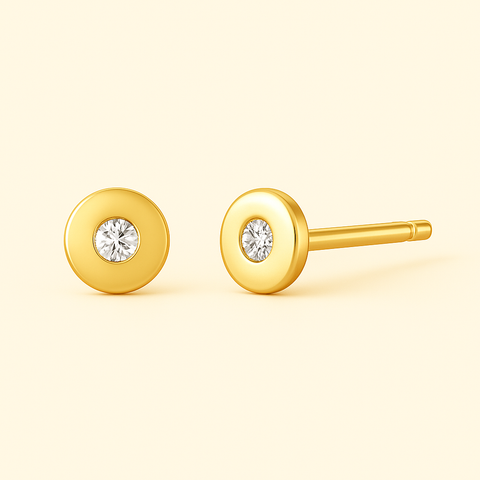 18K Yellow Gold Bezel-Set Cubic Zirconia Stud Earrings featuring round white zirconia stones in polished gold bezel setting, minimalist 4mm studs by Vaskia Jewelry.