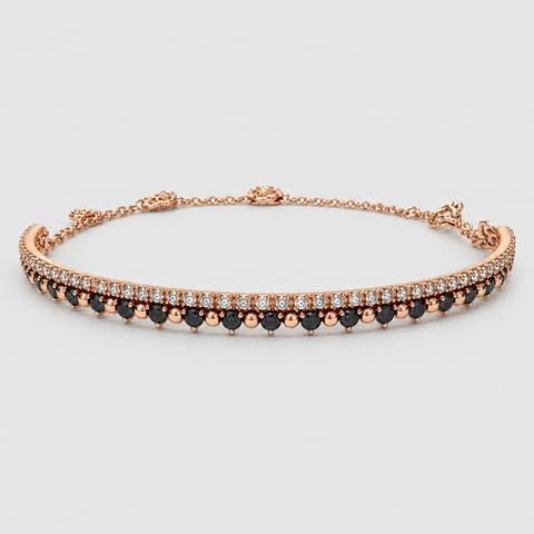 18K rose gold double-row bangle bracelet with black diamond bottom row and white diamond top row, adjustable chain, flat overhead view