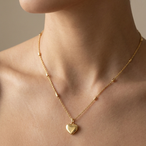 14K Yellow Gold mini heart necklace, side view