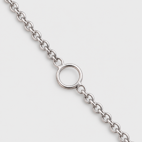 Adjustable 18K white gold chain necklace with extension ring for versatile styling.