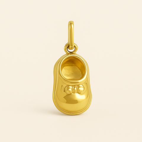 18K yellow gold baby shoe pendant with polished finish and Italian craftsmanship.