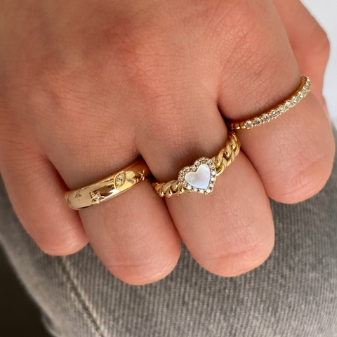 studio image of diamond ring in 14k gold