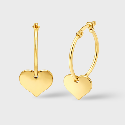 14K yellow gold heart hoop earrings featuring polished dangling heart charms, romantic anniversary, birthday, or Valentine’s Day gift for her.