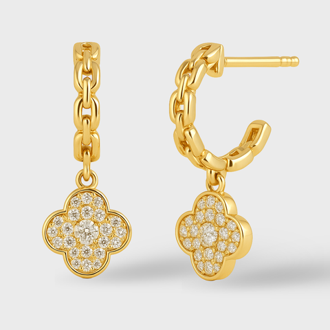 14K gold diamond clover dangle huggie earrings with pavé-set round white diamonds.
