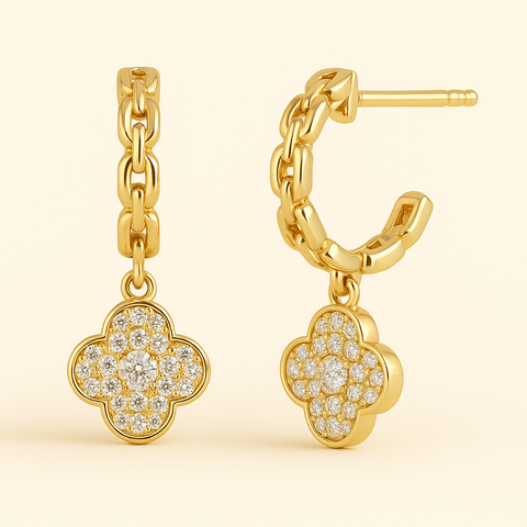 14K gold diamond clover dangle huggie earrings with pavé-set round white diamonds.