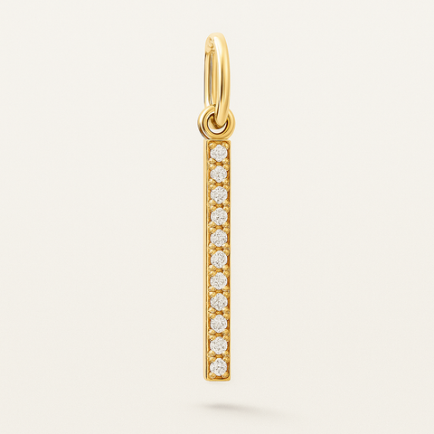 14K yellow gold pavé diamond bar charm with 8 round white diamonds and polished bail.