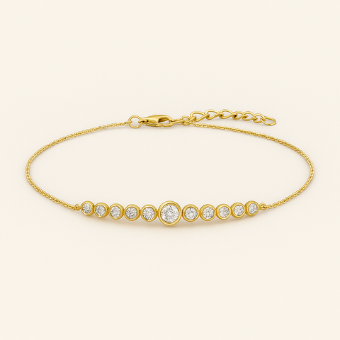 14K yellow gold bracelet featuring 11 bezel-set round white diamonds in a sleek bar design with adjustable chain.
