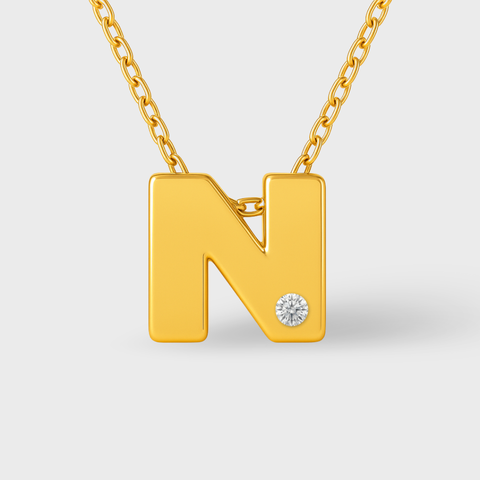 14K Yellow Gold diamond initial necklace with round white diamonds, worn view
