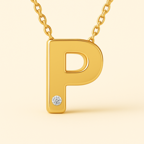 Close-up of 14K gold initial P pendant necklace with diamond accent and polished finish.