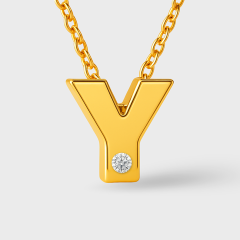 14K Yellow Gold diamond initial necklace with round white diamonds, side view