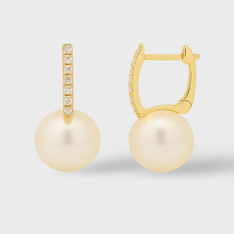 14K Yellow Gold diamond and pearl huggie earrings with round white diamonds, front view