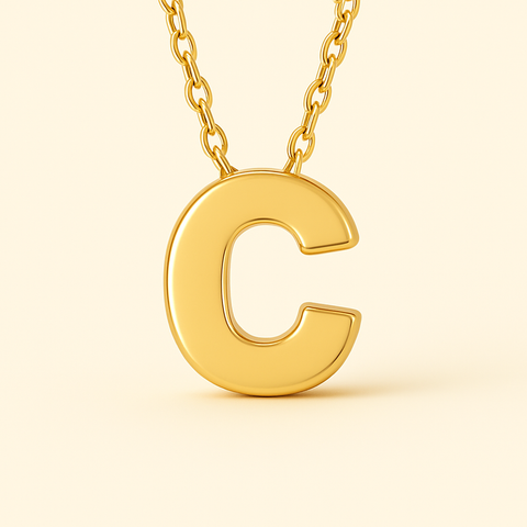 Close-up of 14K gold initial pendant necklace with polished finish on adjustable chain.