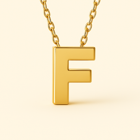 Close-up of 14K gold initial F pendant necklace with polished finish on adjustable chain.