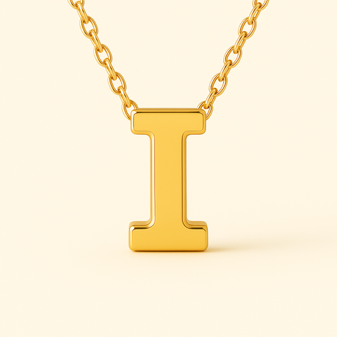 Close-up of 14K gold initial I pendant necklace with polished finish on adjustable chain.
