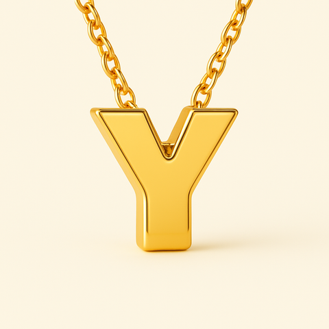 Close-up of 14K gold initial Y pendant necklace with polished finish on adjustable chain.