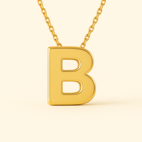 Close-up of 14K gold initial pendant necklace with polished finish on adjustable chain.