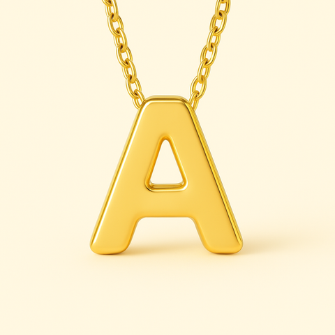 Close-up of 14K gold initial pendant necklace with polished finish on adjustable chain.