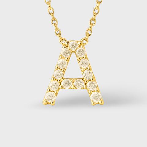 14K Yellow Gold pavé diamond initial necklace with round white diamonds, front view