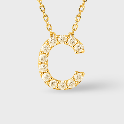 14K Yellow Gold pavé diamond initial necklace with round white diamonds, detail view