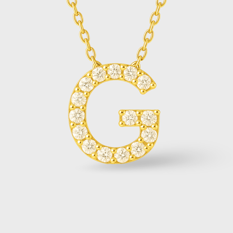 14K Yellow Gold pavé diamond initial necklace with round white diamonds, side view
