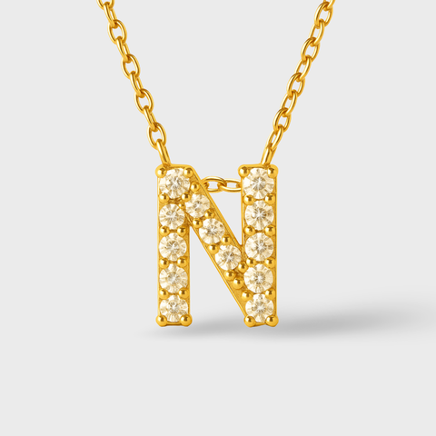 14K Yellow Gold pavé diamond initial necklace with round white diamonds, worn view