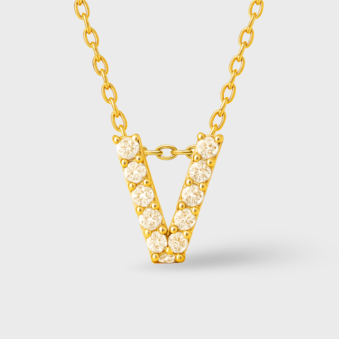 14K Yellow Gold pavé diamond initial necklace with round white diamonds, angle view