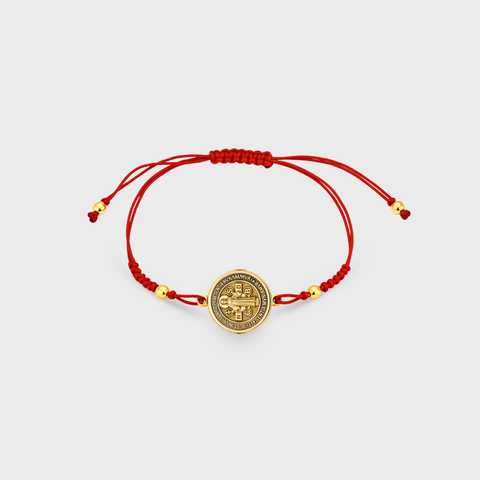 14K Yellow Gold two tone st. benedict on red silk bracelet, front view