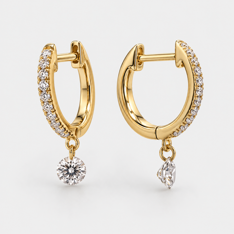 Side view of Diamond Drop Huggie Earrings in 14K Yellow Gold.