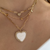 Discover elegance with the 14Kt Yellow Gold Diamond Heart Link Necklace. Featuring a pavé heart pendant with 0.20 ctw diamonds on a modern link chain. Perfect gift of love.