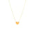 Close-up of 14K gold diamond heart pendant necklace on fine chain.